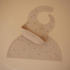 mushie Silicone Baby Bib | Adjustable Fit Waterproof Bibs - Image 2