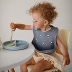 mushie Silicone Baby Bib | Adjustable Fit Waterproof Bibs - Image 2