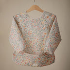 mushie Long Sleeve Baby Bib | Water Resistant Adjustable Fit - Image 2